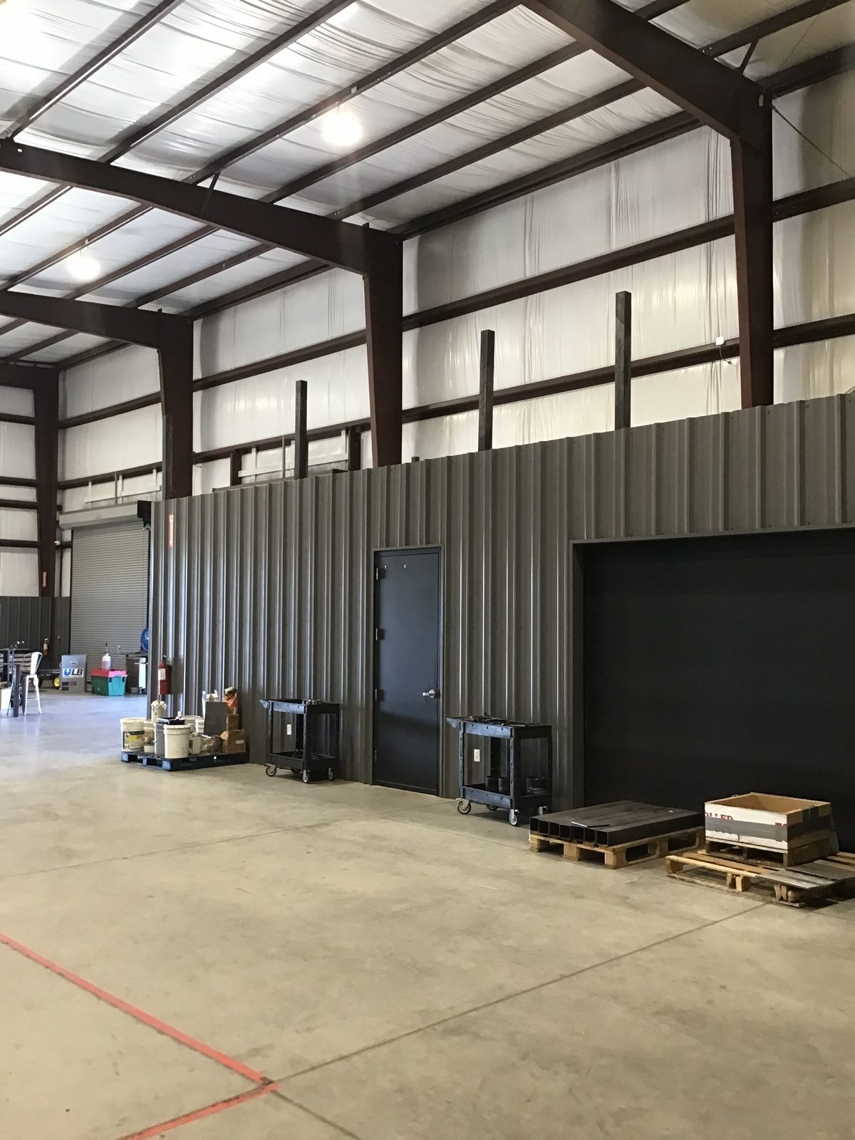 Interior metal-building shell before buildout