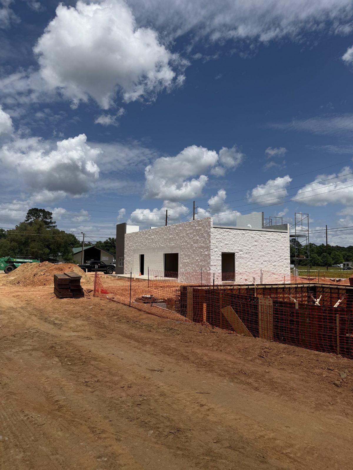 Masonry building shell rising