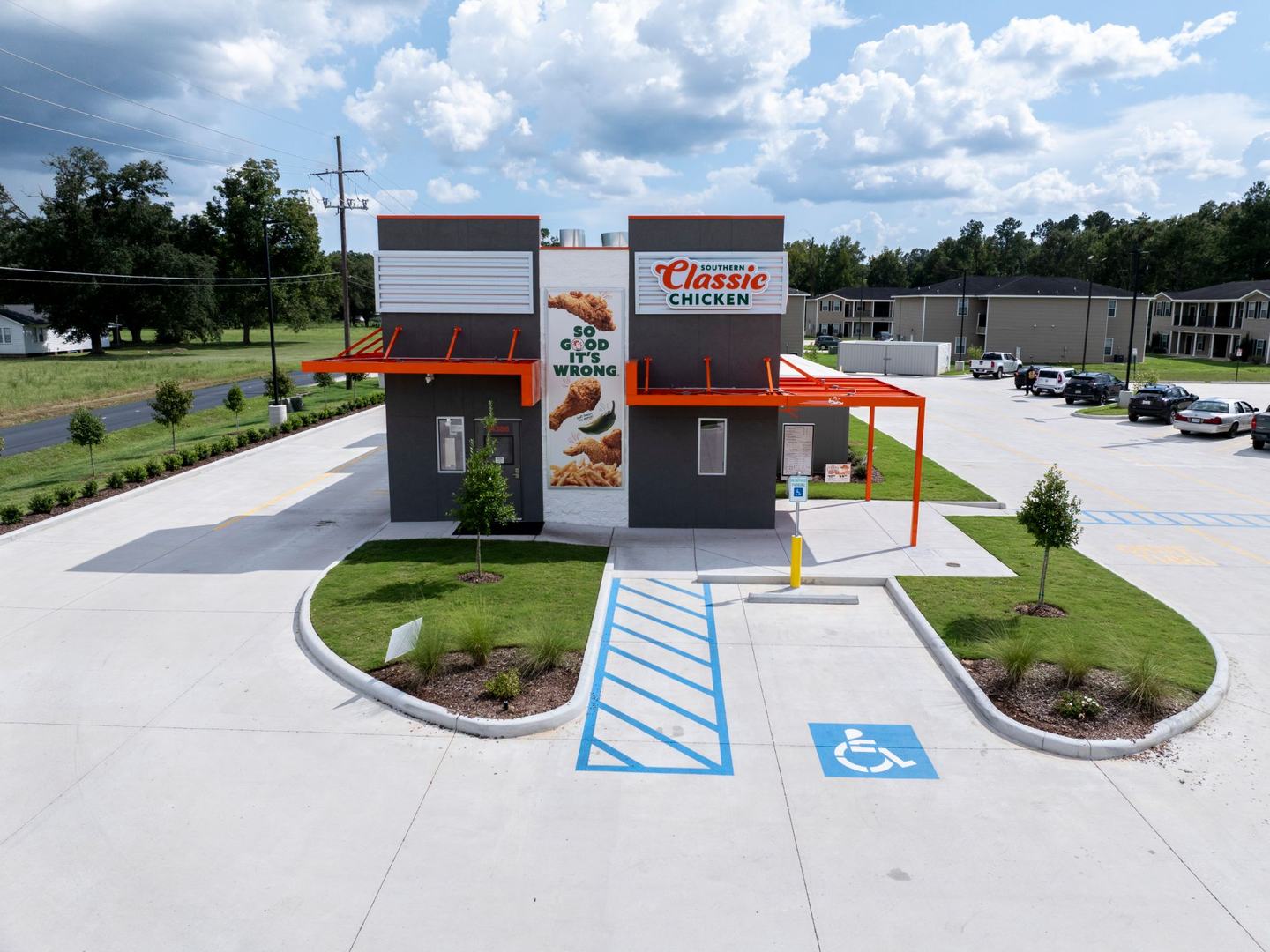 Front elevation of the finished restaurant with accessible parking